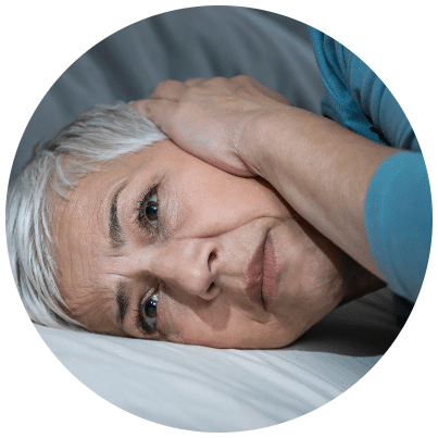 Woman losing sleep from hyperacusis